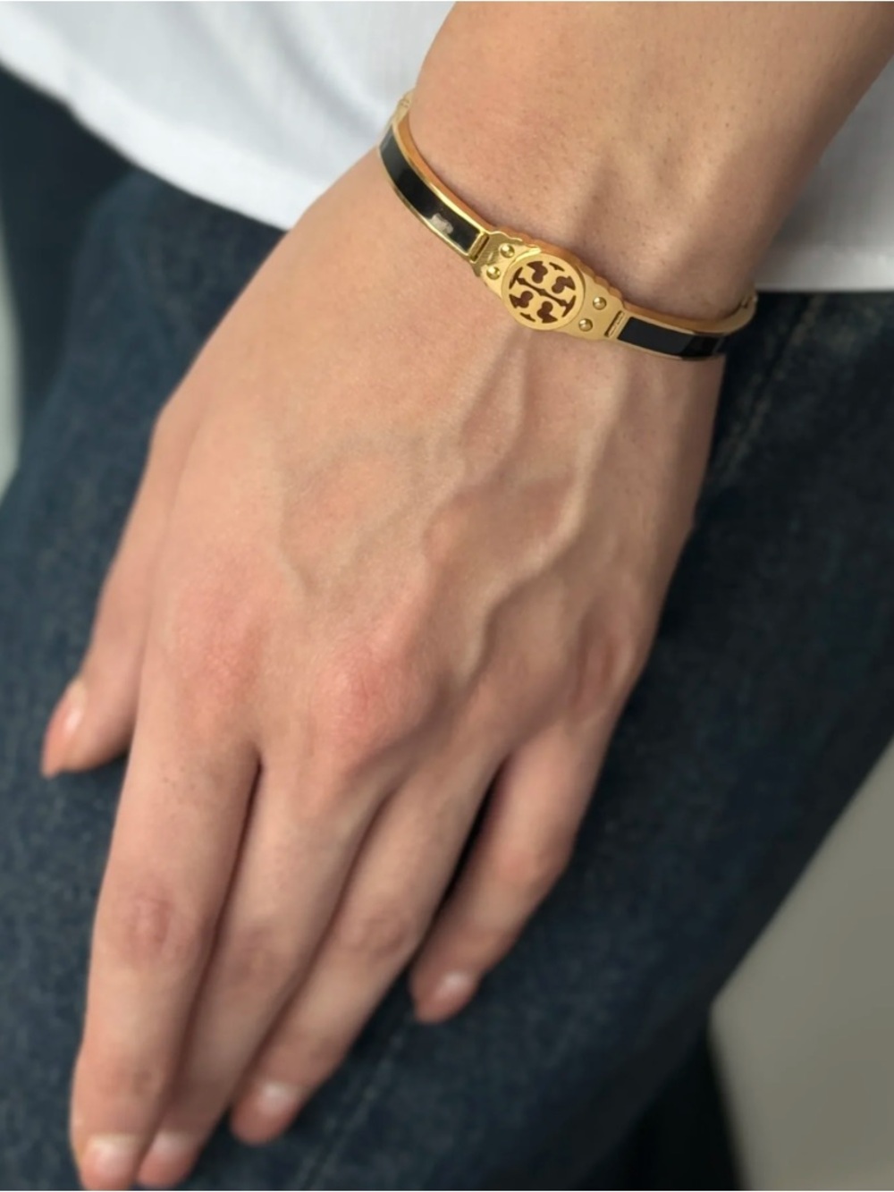 Tory burch bangle in black and gold